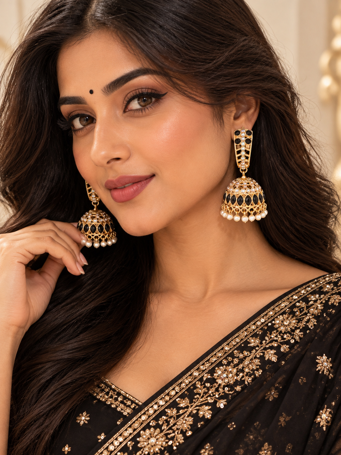 Indian design gold, white, and black earrings Main image